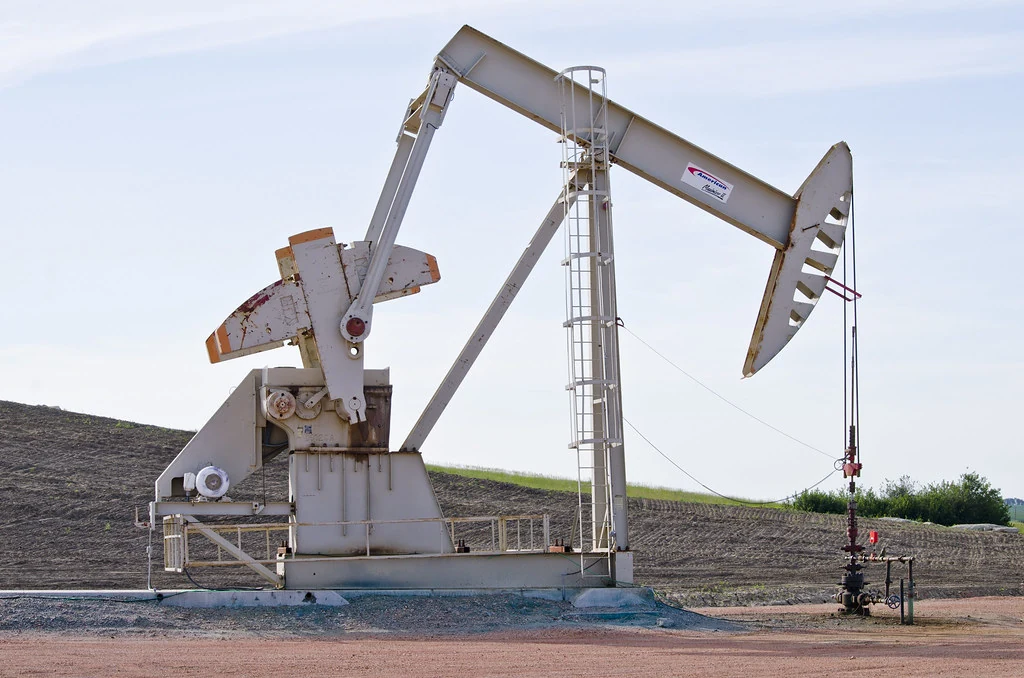 Oil well pumpjack operating in a producing field